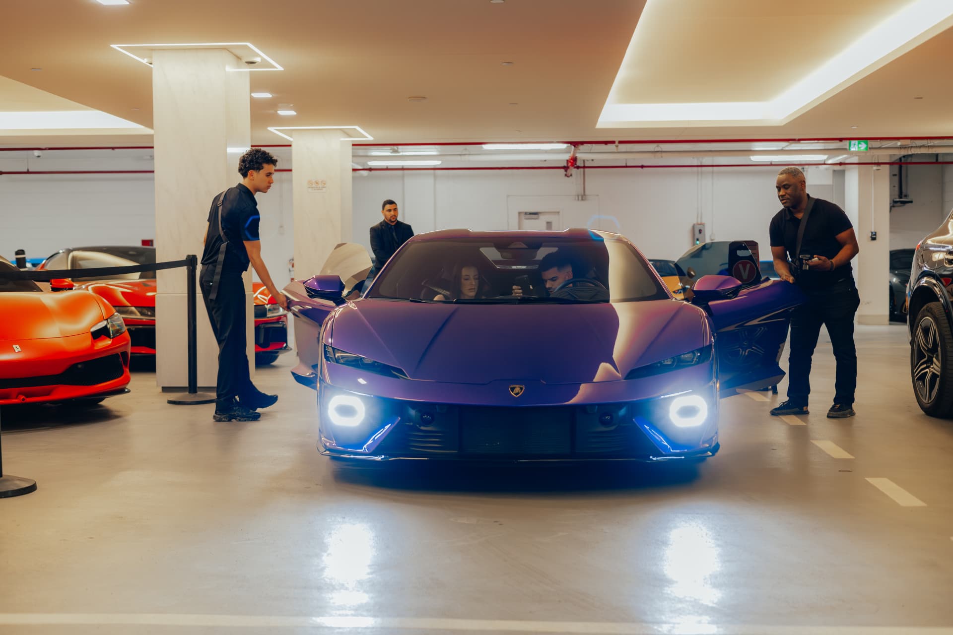 Eminent Valet team receiving luxury vehicles in a hotel parking facility